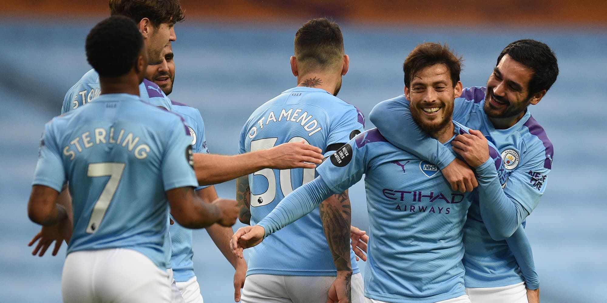 Les Citizens célèbrent un quatrième but marqué contre Newcastle United en Premier League, à Manchester, le 8 juillet 2020.
