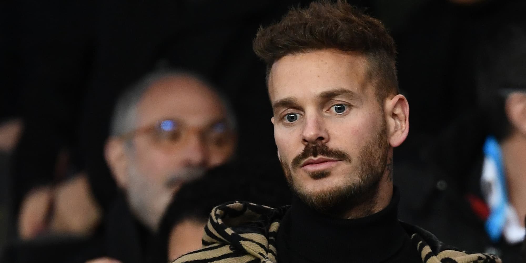 M Pokora lors du match PSG - OM en mars 2019.