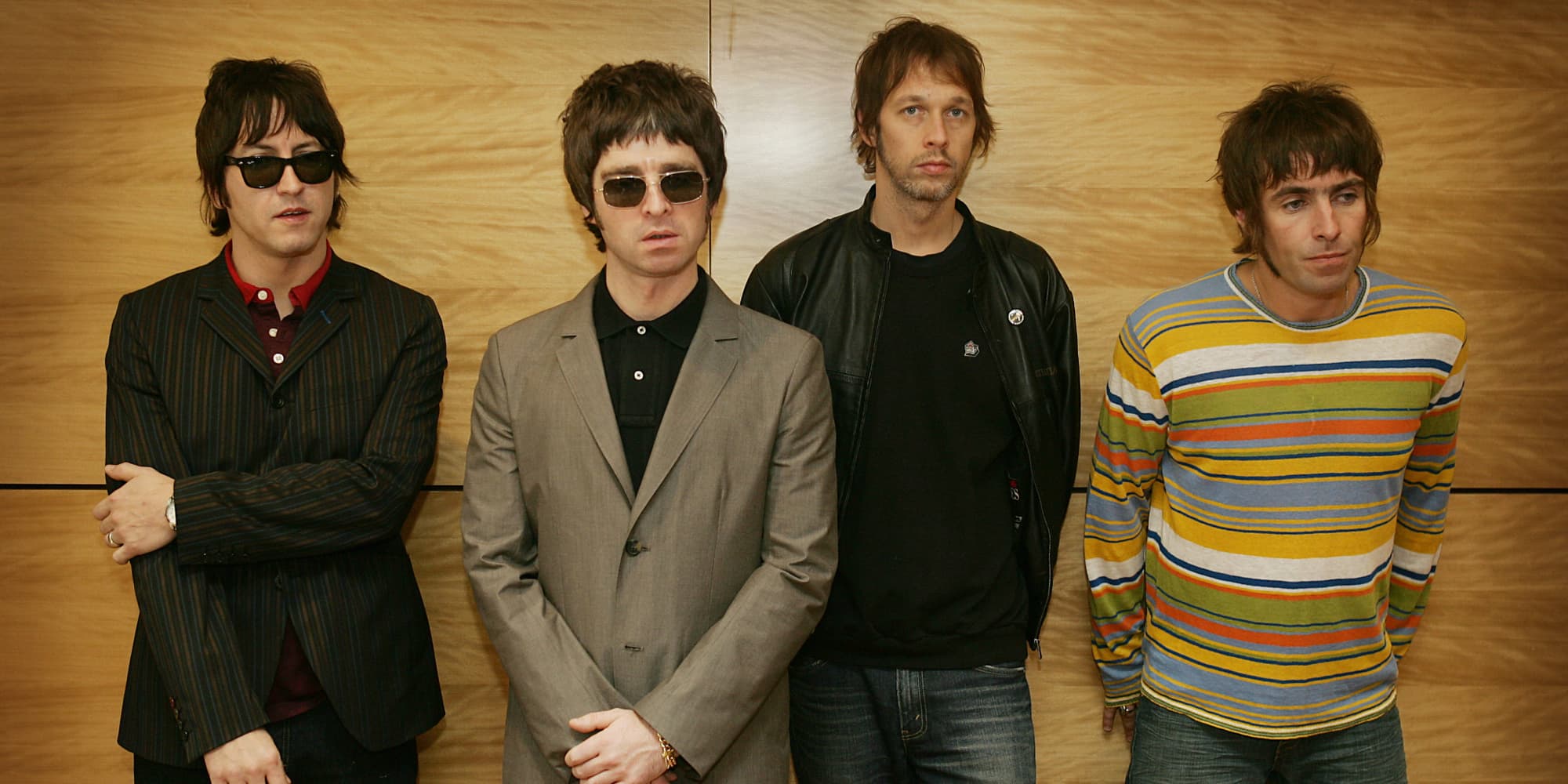 Oasis, à la belle époque : Gem Archer, Noel Gallagher, Andy Bell et Liam Gallagher en photocall à Hong Kong, le 25 février 2006.