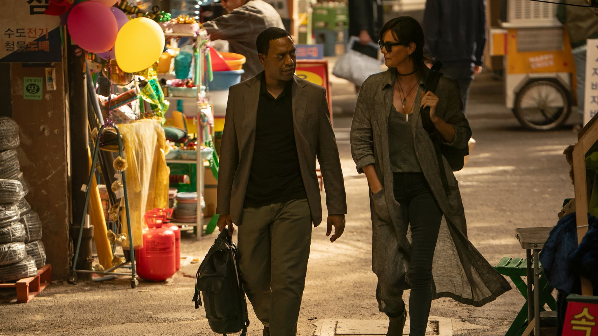 Copley (Chiwetel Ejiofor). Andy (Charlize Theron) work side by side in side "The Old Guard 2". old guard 2: recap 'of